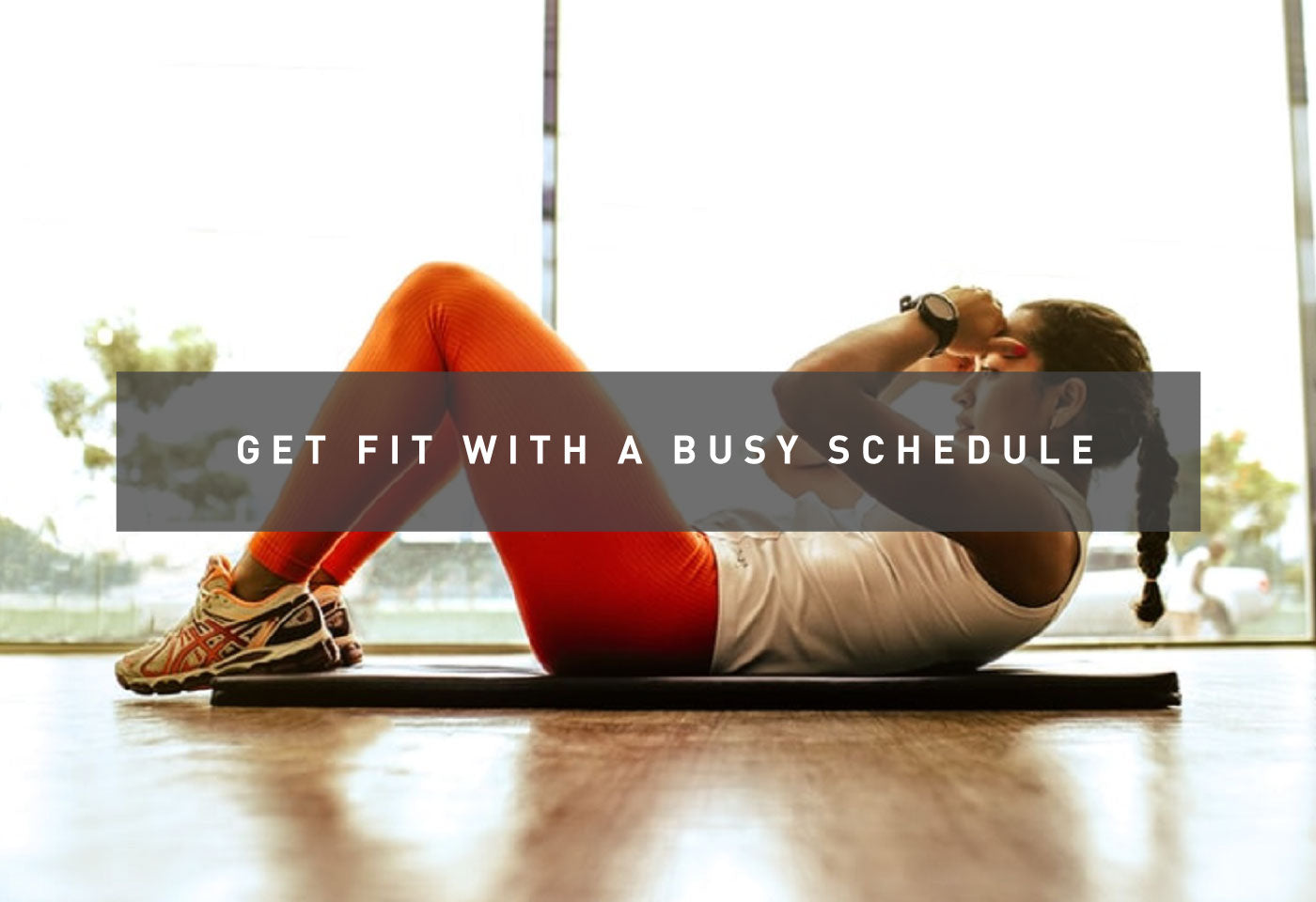 Get Fit with a Busy Schedule a Woman Doing Crunches